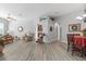 Open living room with hardwood floors and comfortable seating at 12157 Se 175Th Loop, Summerfield, FL 34491