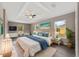 Spacious main bedroom with a large bed and plenty of natural light at 1637 Sw 168Th Loop, Ocala, FL 34473