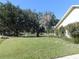 Landscaped backyard with pond and fountain views at 3282 Sw 9Th Ave, Ocala, FL 34471