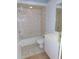 Clean bathroom with tub, toilet, and vanity at 3282 Sw 9Th Ave, Ocala, FL 34471