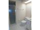 Clean bathroom featuring a shower and toilet at 3282 Sw 9Th Ave, Ocala, FL 34471