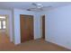 Spacious bedroom with double-door closet and carpeting at 3282 Sw 9Th Ave, Ocala, FL 34471
