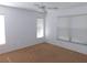 Spacious bedroom with neutral carpeting and two windows at 3282 Sw 9Th Ave, Ocala, FL 34471