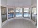Bright dining room with pool view and window seating at 3282 Sw 9Th Ave, Ocala, FL 34471