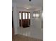 Interior entryway with tiled floor and wood door at 3282 Sw 9Th Ave, Ocala, FL 34471