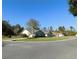 House exterior showcasing a manicured lawn and neighborhood view at 3282 Sw 9Th Ave, Ocala, FL 34471