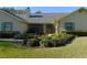 House exterior with landscaping and walkway to entryway at 3282 Sw 9Th Ave, Ocala, FL 34471