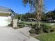 Landscaped front yard with walkway leading to house entry at 3282 Sw 9Th Ave, Ocala, FL 34471