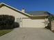 Attached garage with automatic door opener at 3282 Sw 9Th Ave, Ocala, FL 34471