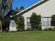House exterior showcasing a well-maintained yard and landscaping at 3282 Sw 9Th Ave, Ocala, FL 34471