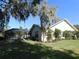 One-story home with landscaped yard and pool at 3282 Sw 9Th Ave, Ocala, FL 34471