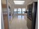 Bright kitchen with stainless steel appliances and pool view at 3282 Sw 9Th Ave, Ocala, FL 34471