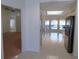 Kitchen with tiled floor, stainless steel appliances, and view of Gathering room at 3282 Sw 9Th Ave, Ocala, FL 34471
