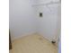 Laundry room with tile floor and shelving at 3282 Sw 9Th Ave, Ocala, FL 34471