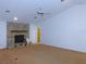 Living room features a stone fireplace and high ceilings at 3282 Sw 9Th Ave, Ocala, FL 34471