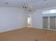 Living room with vaulted ceiling and french doors at 3282 Sw 9Th Ave, Ocala, FL 34471