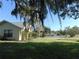 Residential street with mature trees and homes at 3282 Sw 9Th Ave, Ocala, FL 34471