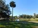 Serene community pond with fountain and gazebo at 3282 Sw 9Th Ave, Ocala, FL 34471