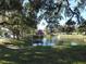 Serene pond and gazebo, perfect for relaxing at 3282 Sw 9Th Ave, Ocala, FL 34471