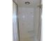 Clean shower with tiled walls and built-in corner seat at 3282 Sw 9Th Ave, Ocala, FL 34471
