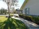 Sidewalk leading to house entrance, with well-maintained landscaping at 3282 Sw 9Th Ave, Ocala, FL 34471