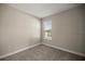 Well-lit bedroom with a window offering a neighborhood view at 3940 Se 5Th Ave, Ocala, FL 34480