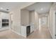 Kitchen hallway with wine cooler and built-in cabinets at 3940 Se 5Th Ave, Ocala, FL 34480