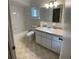 Clean bathroom with a shower/tub combo and updated vanity at 6183 Sw 63Rd St, Ocala, FL 34474