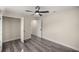 Bright bedroom with wood-look floors and ample closet space at 6610 Sw 109Th Ln, Ocala, FL 34476