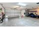 Garage with golf cart and extra storage at 725 Beldon Ct, The Villages, FL 32162