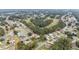 Wide aerial view of community near golf course at 11661 Sw 70Th Ct, Ocala, FL 34476