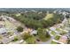 Aerial view showcasing home, neighborhood, and golf course at 11661 Sw 70Th Ct, Ocala, FL 34476