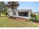 House exterior view with well maintained lawn at 11661 Sw 70Th Ct, Ocala, FL 34476