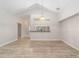 Bright dining area with vaulted ceiling and wood-look floors at 11661 Sw 70Th Ct, Ocala, FL 34476