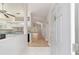 Open entryway, view of kitchen and living areas at 11661 Sw 70Th Ct, Ocala, FL 34476