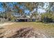 Large backyard with shed and mature trees at 15330 Sw 59Th Ct, Ocala, FL 34473