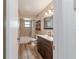 Clean bathroom with updated vanity and tiled flooring at 15330 Sw 59Th Ct, Ocala, FL 34473