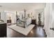 Main bedroom with dark wood floors and an ornate bed frame at 15330 Sw 59Th Ct, Ocala, FL 34473