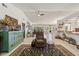 Bright living room with tile floors, comfy recliner, and unique decor at 15330 Sw 59Th Ct, Ocala, FL 34473