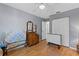 Bedroom with antique dresser and built-in closet at 17819 Se 105Th Ct, Summerfield, FL 34491