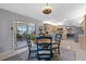 Bright dining area with kitchen access and breakfast bar at 17819 Se 105Th Ct, Summerfield, FL 34491