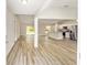 Bright entryway with wood-look vinyl flooring leading to the living areas at 22160 Sw Neptune Blvd, Dunnellon, FL 34431