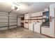 Garage with washer, dryer, and storage shelves at 24 Banyan Dr, Ocala, FL 34472