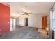 Living room with vaulted ceiling and fan at 24 Banyan Dr, Ocala, FL 34472