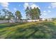 Large backyard with a storage shed and mature trees at 5023 Sw 106 St, Ocala, FL 34474