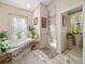 Spa-like bathroom with soaking tub and separate shower at 5346 N Persimmon Dr, Beverly Hills, FL 34465