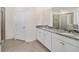 Elegant bathroom with granite countertops and double sinks at 6071 Sw 93Rd Loop, Ocala, FL 34476