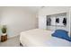 Simple bedroom with a built-in closet and neutral walls at 6071 Sw 93Rd Loop, Ocala, FL 34476