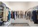 Large walk-in closet with plenty of shelving and hanging space at 6071 Sw 93Rd Loop, Ocala, FL 34476