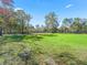 Large grassy pasture with wooden fencing at 965 Nw 73Rd Ter, Ocala, FL 34482